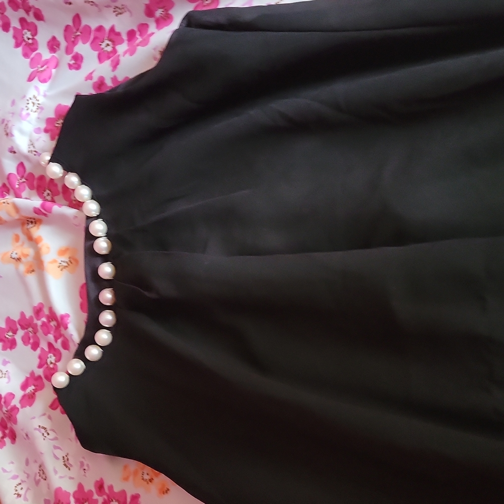 Pearl neck peplum top